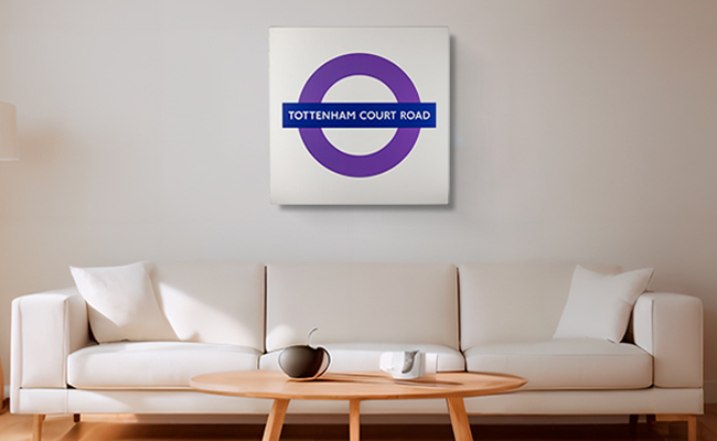 Elizabeth line sign mounted on a cream wall
