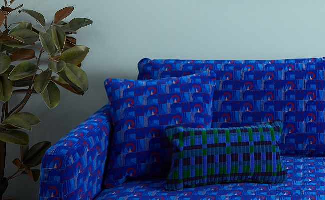 Straub and barman cushions sitting on barman upholstered sofa